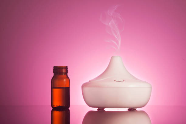 Aroma oil diffuser lamp stock photo