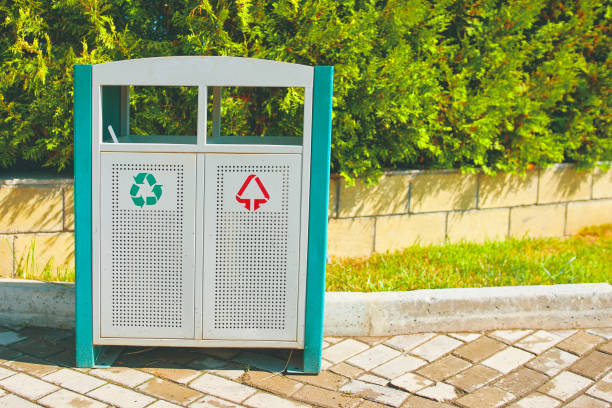 istock Trash can on the alley in the park area. 1276986526