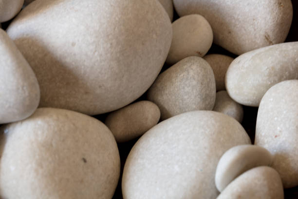 istock White sand stone decoration in garden background 1276987242
