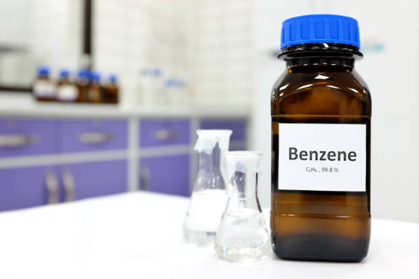 istock Selective focus of benzene liquid chemical compound solvent in dark glass bottle inside a chemistry laboratory with copy space. Aromatic hydrocarbon used in petrochemical industry. 1276989486