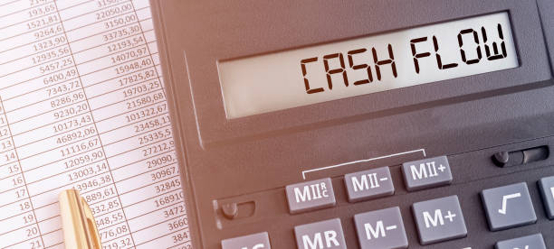 istock word cash flow on calculator extra close up with accounting financial documents 1276991067