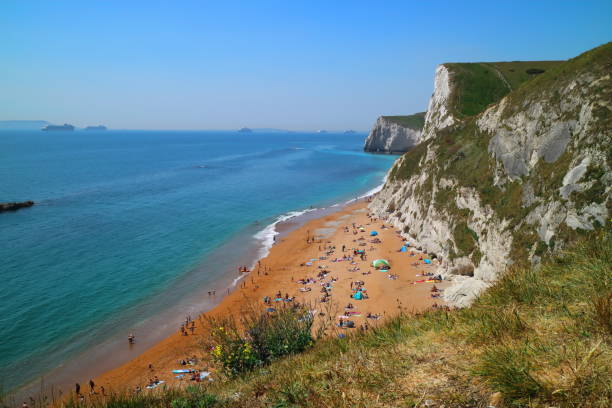 istock Durdle Door Cliff Lookout, Dorset on a sunny day 1276993846