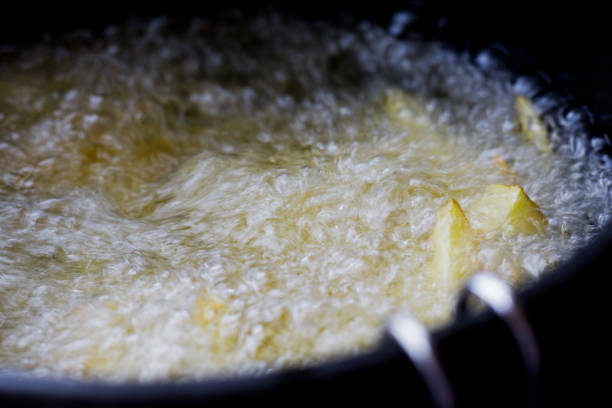 istock Detail of frying chips 1276994201