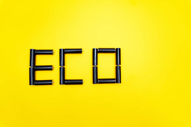 istock Word eco made from black baatteries on yellow background, ecolody concept, eco friendly, copy space. 1276994562