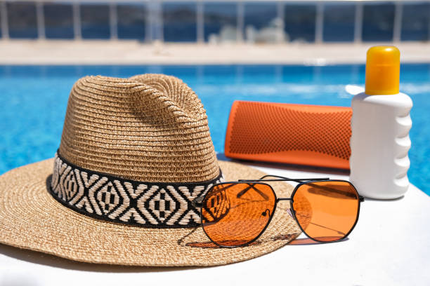 istock orange coloured beach accessories near swimming pool 1276995349