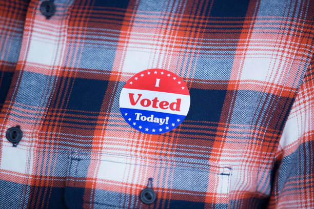 istock Voters at Polling Place 1276997479