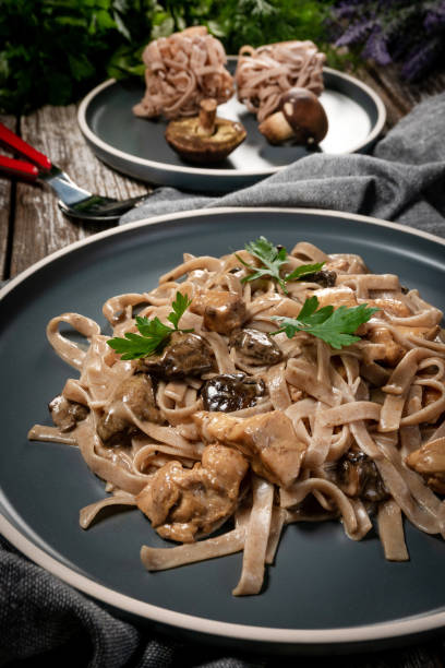 istock Italian pasta with chicken and mushrooms. 1277004621