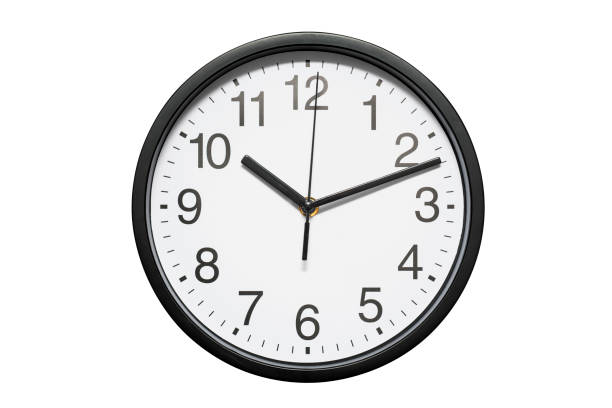 istock Black office wall clock with white dial on white background. Black office wall clock isolated on white background 1277004888
