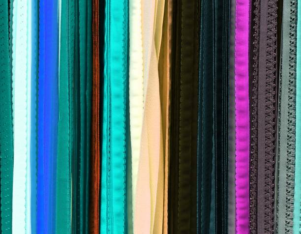 istock Detailed close up view on samples of cloth and fabrics in different colors found at a fabrics market 1277010643