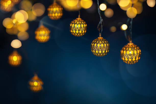 istock Festive Decoration with Garland Lights on dark blue background 1277010822