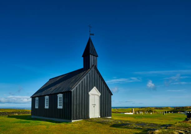istock Black church in Budir, Iceland 1277011372