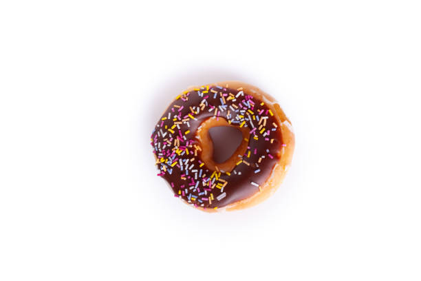 Chocolate donut in glaze on a white background. Fresh tasty chocolate donut