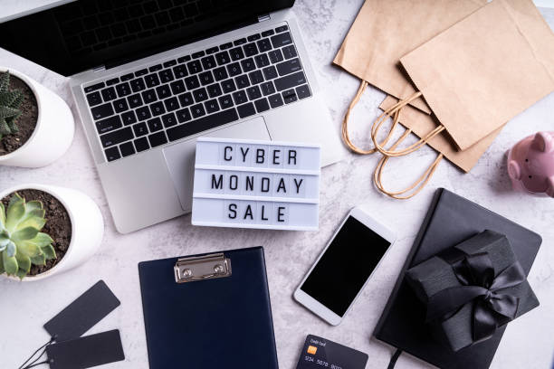 cyber monday sale text on lightbox, top view of workspace flat lay Cyber Monday shopping sale concept. Cyber monday sale text on lightbox, top view of offcice workspace ready for seasonal sales cyber monday stock pictures, royalty-free photos & images