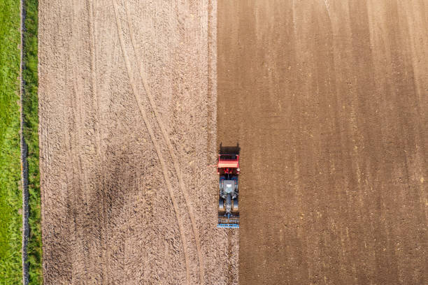 istock The view from a drone looking directly down on a tractor being used to pull a seed drill on a Scottish farm on a late summer day 1277015929