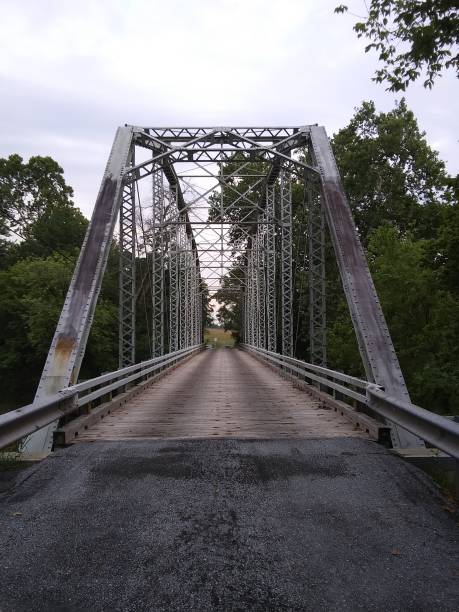 istock Wooden bridge with metal frame 1277016013