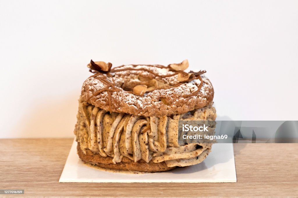 French pastry : Paris-Brest French pastry : cream puff named Paris-Brest Brest - Brittany Stock Photo