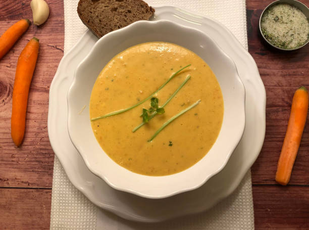 istock Delicious, creamy carrot soup with herbs. 1277017479