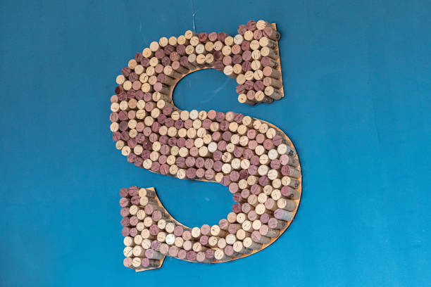 the letter s made of wine corks stock photo