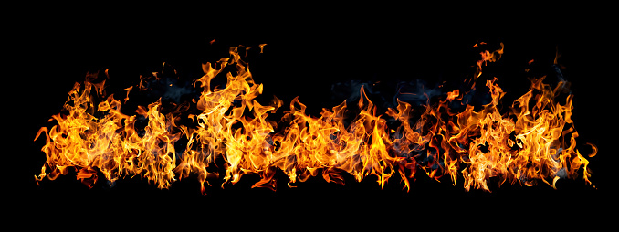 Fire flames on black background, isolated.  Wall of fire