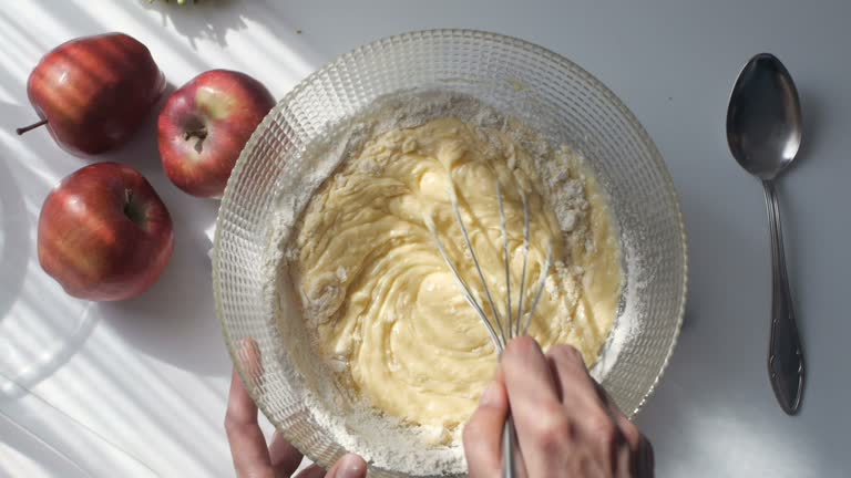 Homemade pastry. Woman mixing cake ingredients