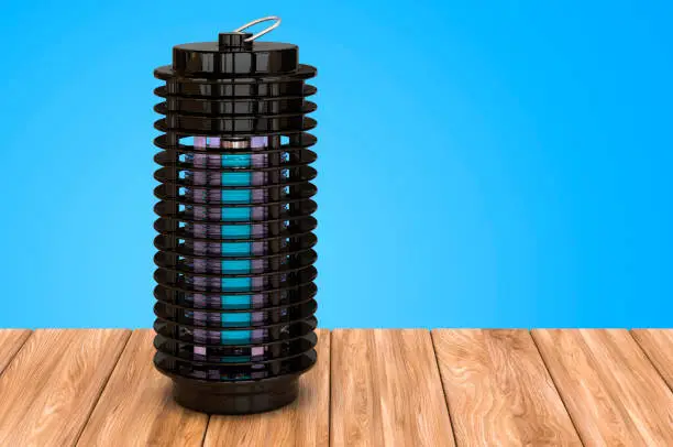 Lamp mosquito electric insect killer, lantern on the wooden table, 3D rendering