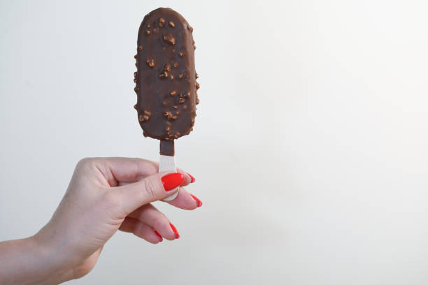 istock Woman holding yummy ice cream. 1277027410