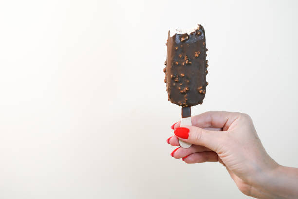 istock Woman holding yummy ice cream. 1277028206