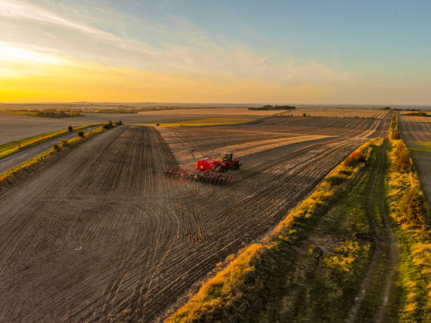 istock Red Tractor Drilling seeds. Wantage, Oxfordshire September 20 1277028452