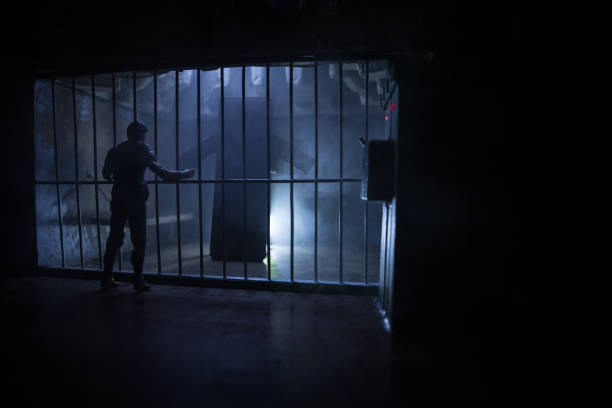 istock Old prison bars cell lock. Creative artwork decoration. Old grunge prison interior. 1277029308