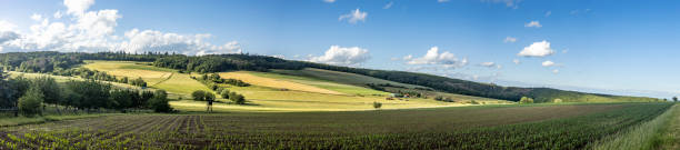 istock Idyllic panorama from farmland and meadows 1277029615