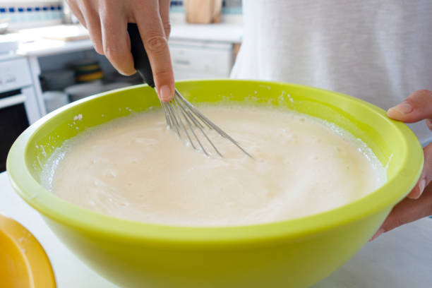 istock Woman preparing pancake batter 1277029704