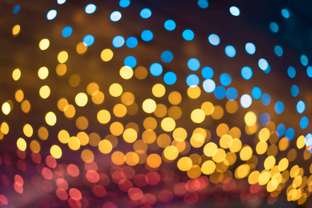istock Texture of colorful shining bokeh on a dark background. 1277031686