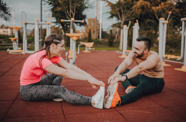 istock Beautiful couple exercising together 1277033396