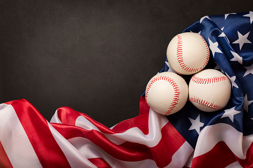Flat lay Sport Baseball Background with three Balls, Flag of USA and copy space