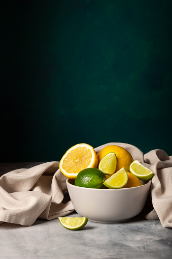 Fresh Citrus Fruits Background with Lemons, Lime and Copy space. Healthy Eating Concept