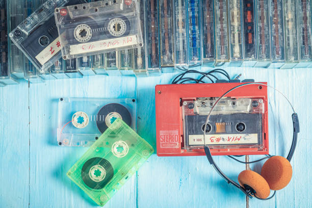 istock Retro cassette tape with headphones and player 1277037171