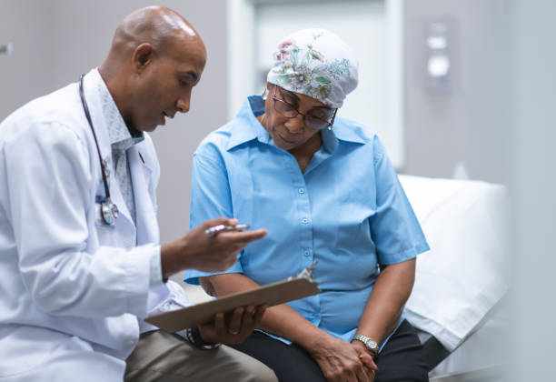 istock Hospital patient discusses with doctor 1277038457