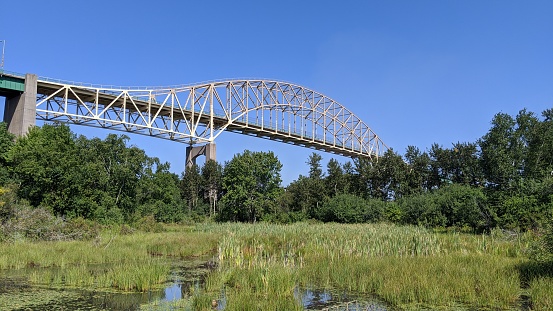 View of the Sault Ste. Marie International Bridge crossing the St. Mary's River separating Canada and the United States in the area of the cities of Sault Ste. Marie (Canada and United States)