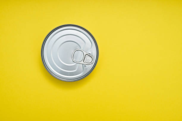 istock Tin can on a yellow background, top view. 1277041009