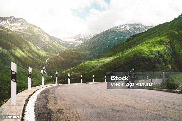 Motorbiker On Furka Pass Road Stock Photo - Download Image Now - Furka Pass, Mountain, Mountain Pass