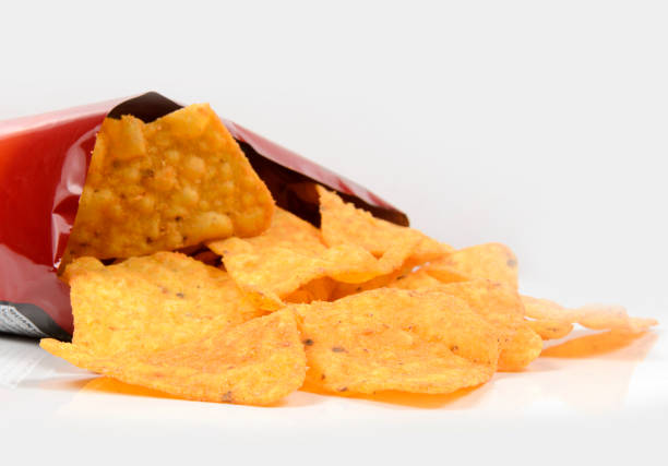 istock Open bag of crisps in a white back ground 1277041066