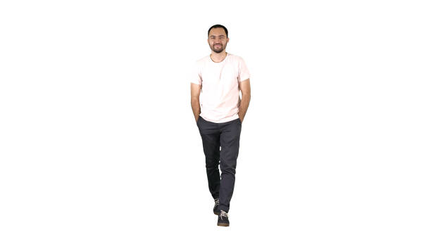 istock Confident young adult man walking forwards and looking at camera 1277044471