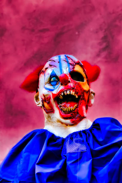 close up halloween party horror clown. the scary clown standing.closeup of a scary evil clown.closeup of a scary evil clown. - welcome to fabulous las vegas sign fotos imagens e fotografias de stock