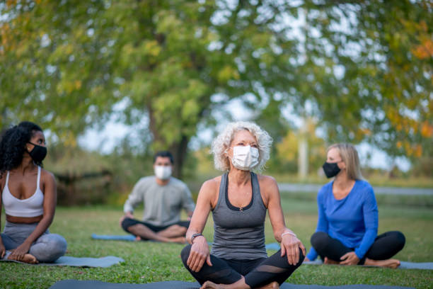 istock Group fitness class outside during the pandemic 1277054385