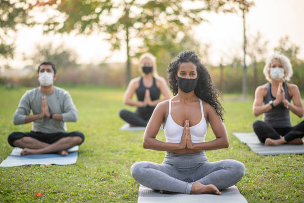 istock Group fitness class outside during the pandemic 1277054432