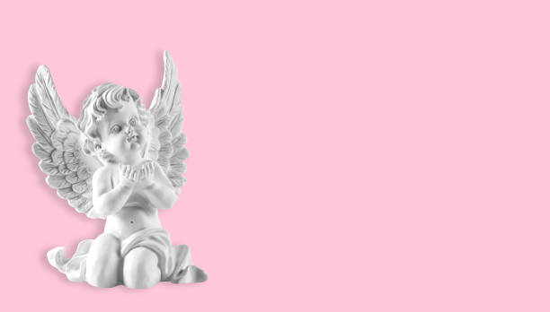 istock White guardian angel pink background 1277055934