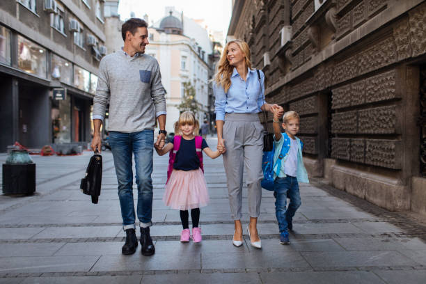 istock Picking them up from school together 1277056809