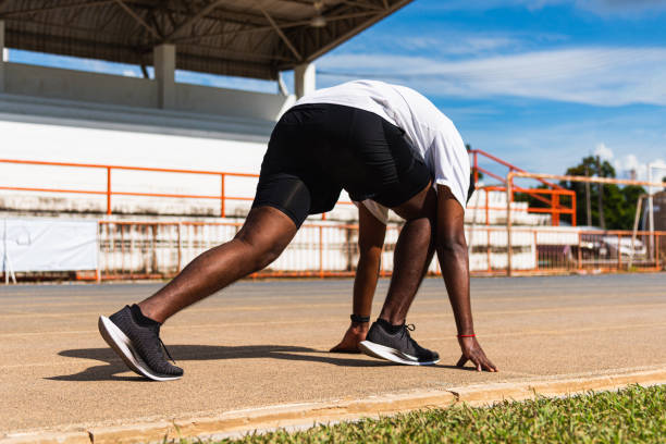 istock sport runner black man active ready to start running training 1277057997