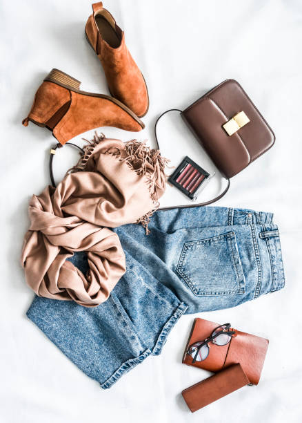 istock Women's clothing and accessories on a light background, top view 1277061752