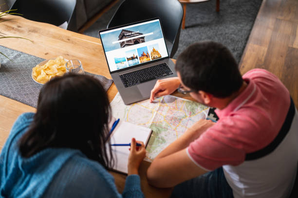 istock Mature Heterosexual Couple Planning A Vacation Together Using Laptop 1277063309